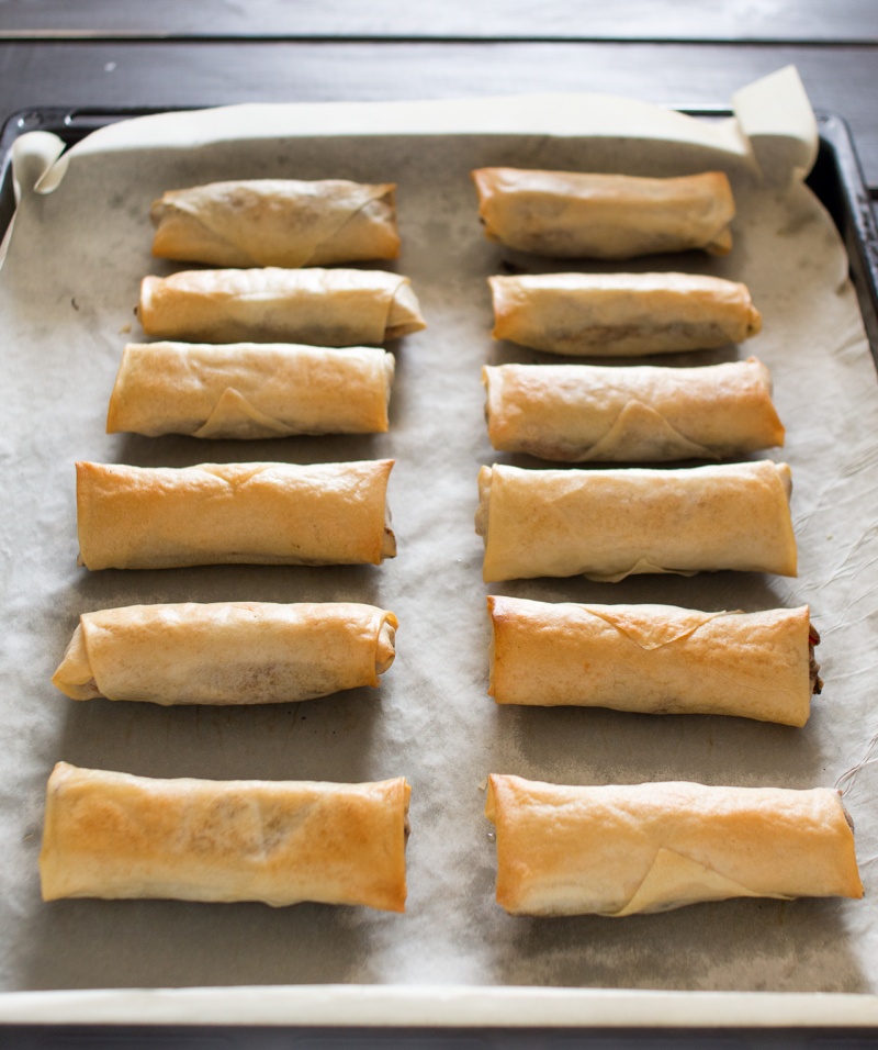vegan baked spring rolls on a baking tray