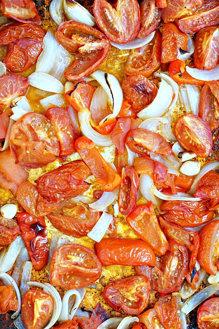 Tomatoes, onions, garlic, and bell pepper get roasted together for this fresh tomato soup. 