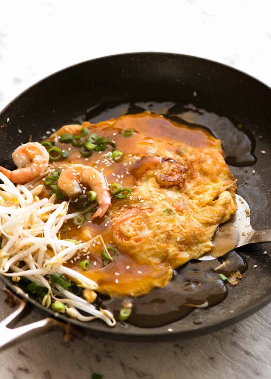 Photo of Egg Foo Young in a black skillet, fresh off the stove