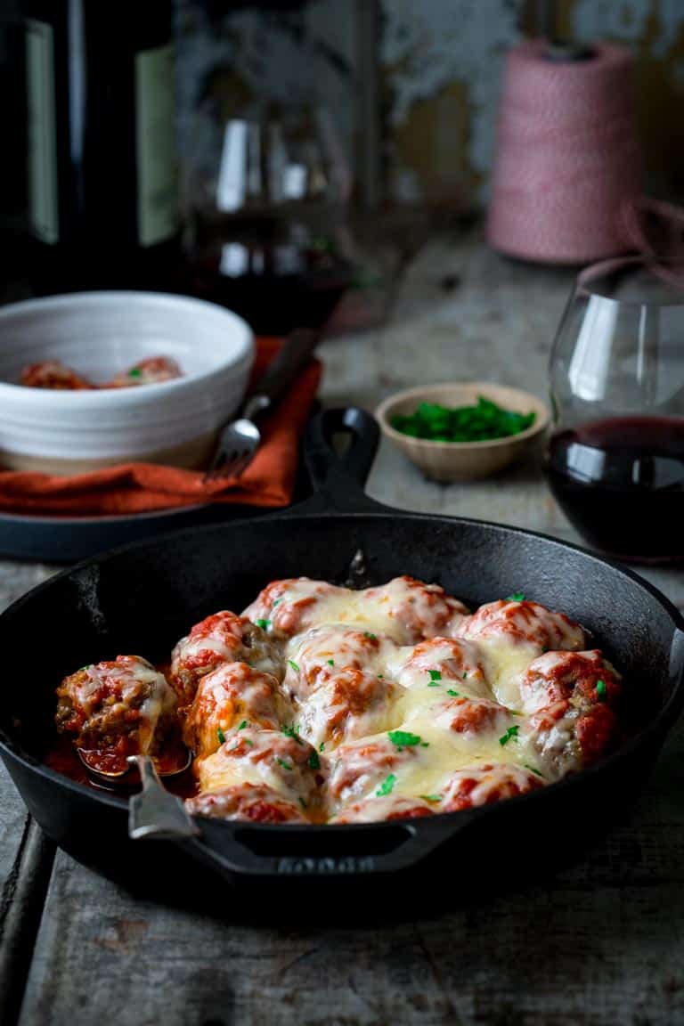 oven baked meatballs in a cast iron skillet