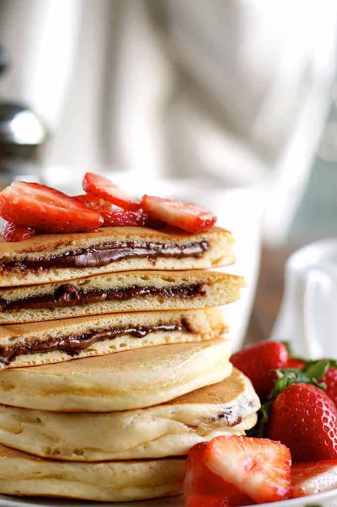 Nutella Pancakes - frozen Nutella discs makes it a breeze to make these Nutella stuffed pancakes! recipetineats.com