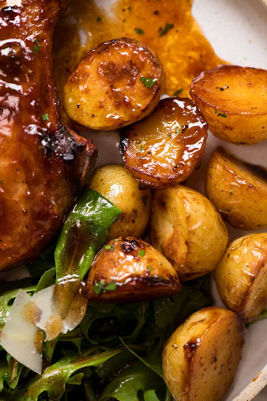 Close up of Oven Roasted potatoes with pork chops